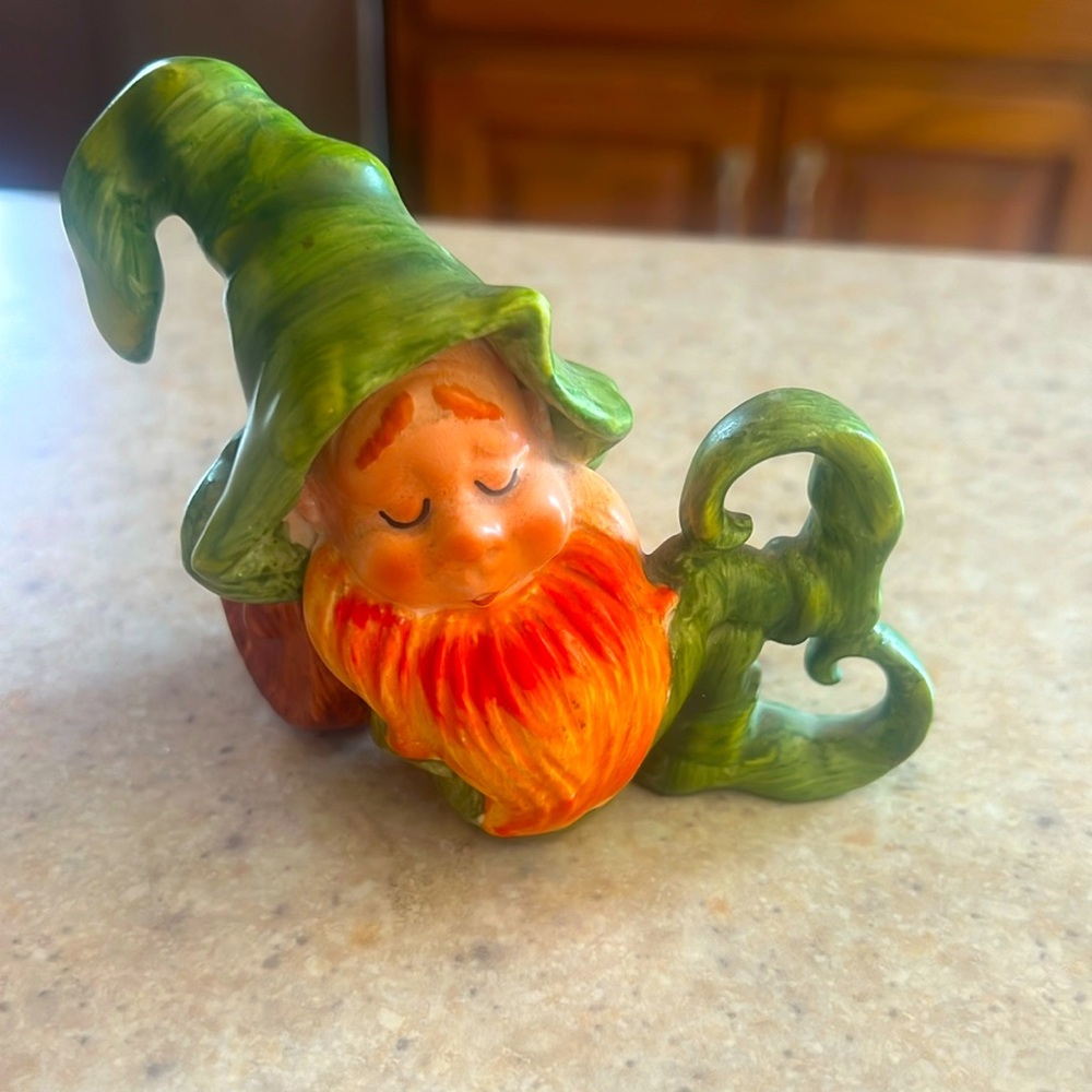 Vintage Lefton sleeping leprechaun with his head resting on a barrel